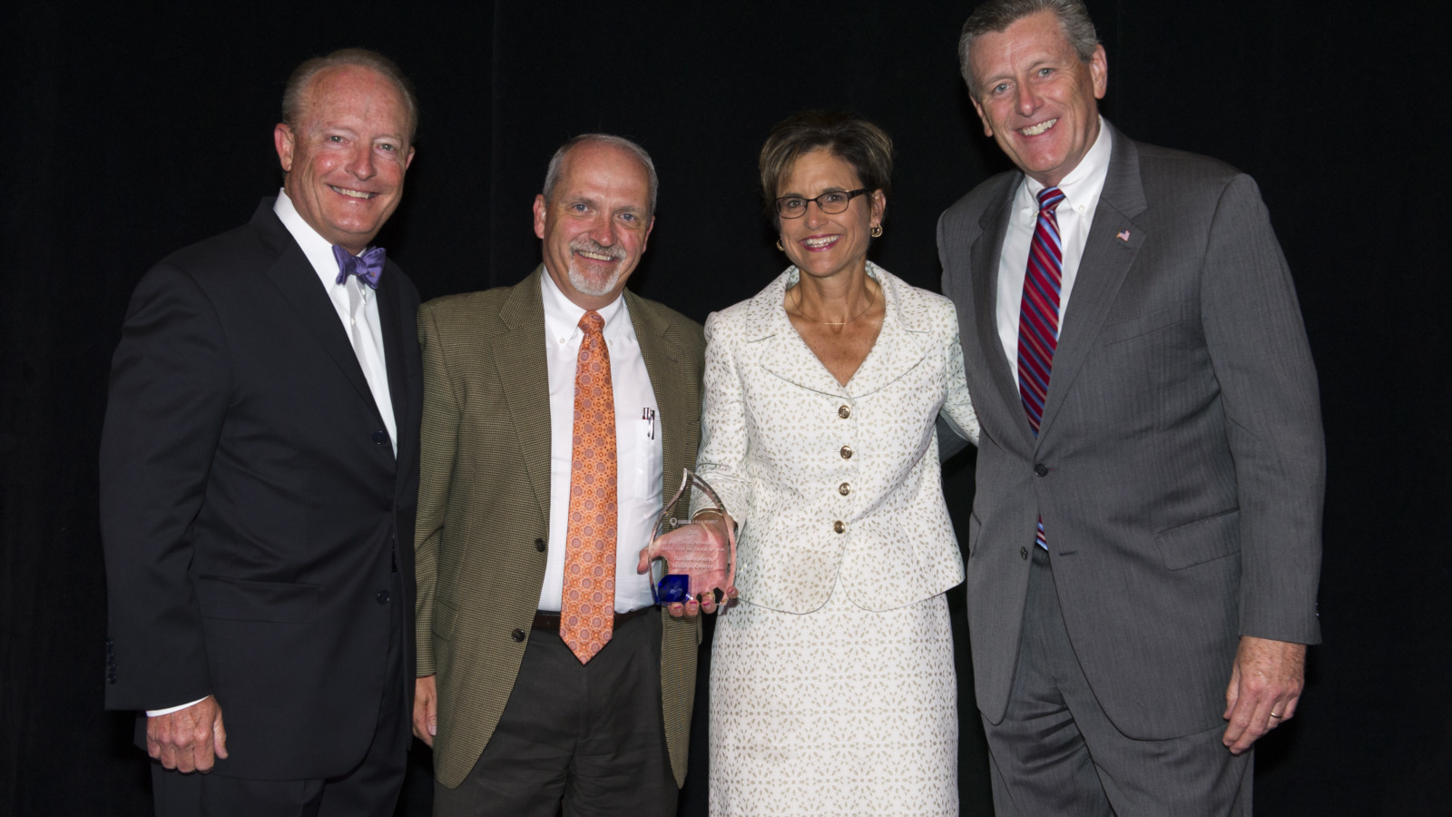 NMC Staff accepting an award