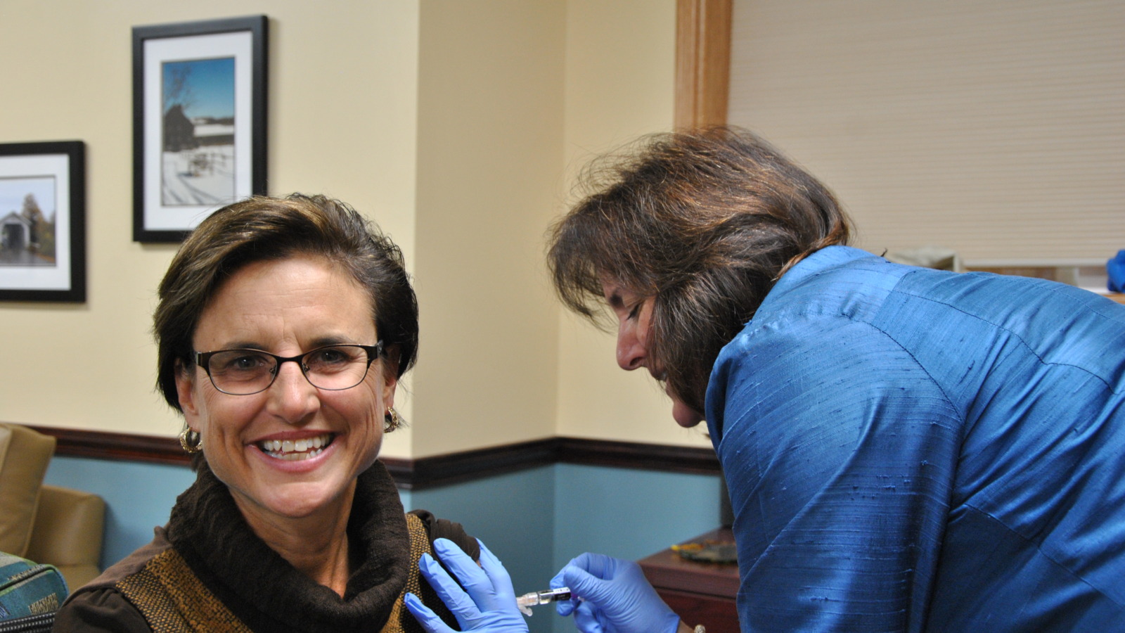 CEO Jill Berry-Bowen receiving her annual flu shot