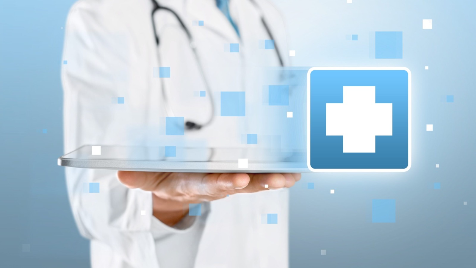 doctor in white lab coat holding a tablet device like a serving tray