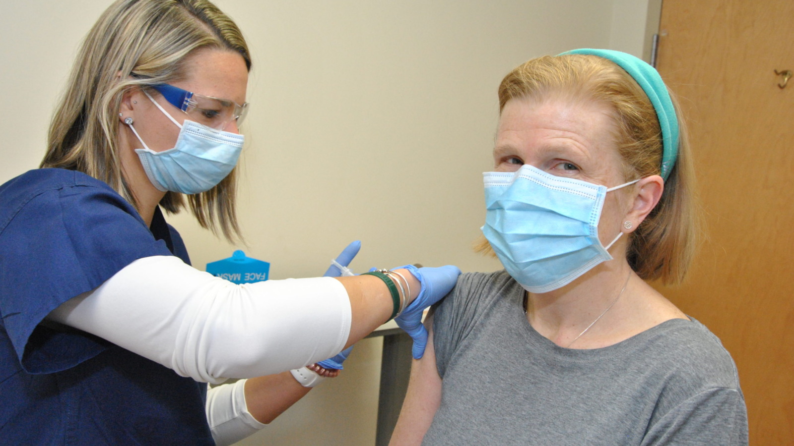 Nurse administering a vaccine