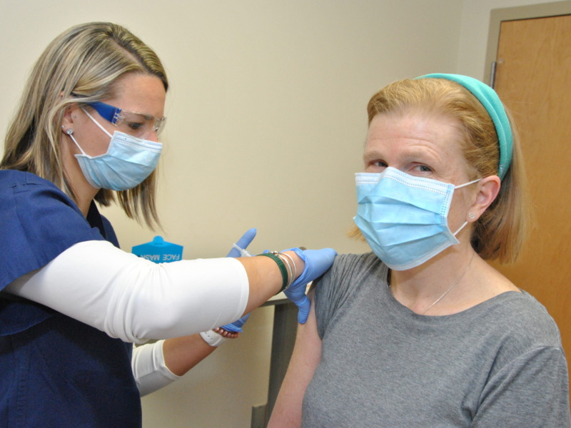 Nurse administering a vaccine