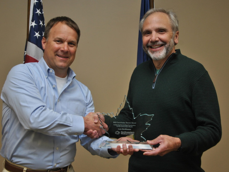 Leon Berthiaume being presented with the NMC Community Service Award
