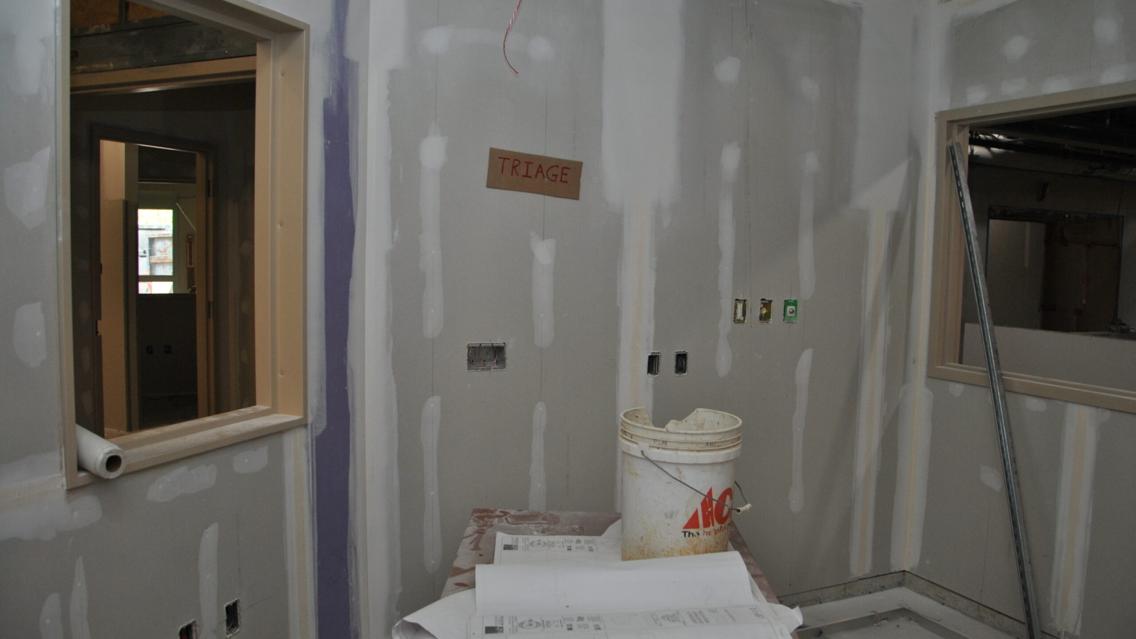 Emergency department triage room under major renovation, new sheet rock walls patched and awaiting paint