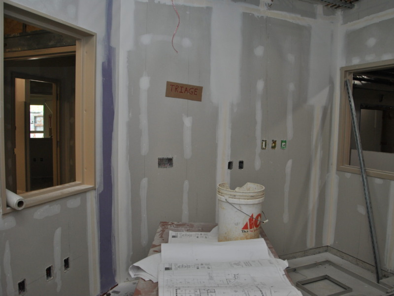 Emergency department triage room under major renovation, new sheet rock walls patched and awaiting paint