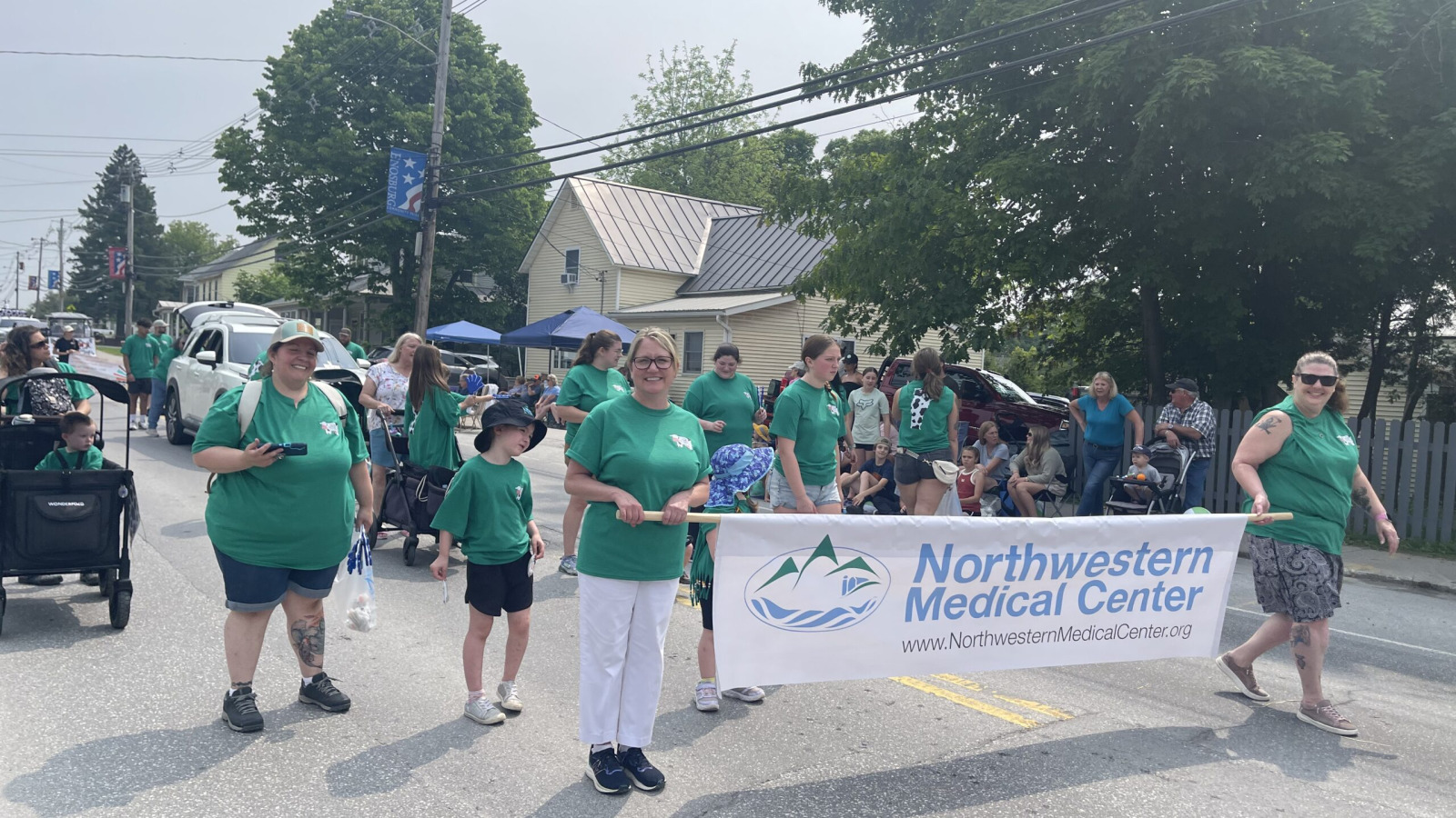 Northwestern Medical Center Group of staff and families walking in a St. Albans city parade