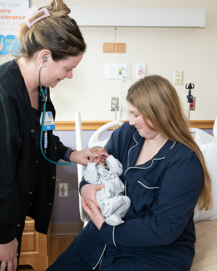 infant being examined by staff on Family Birth Center
