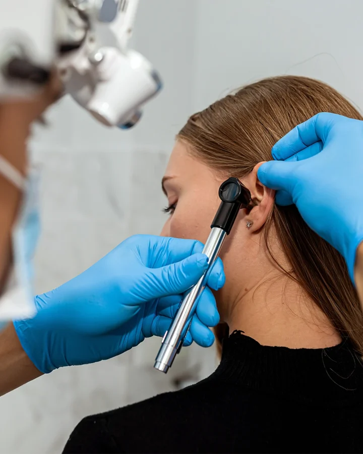 Patient getting an ear exam