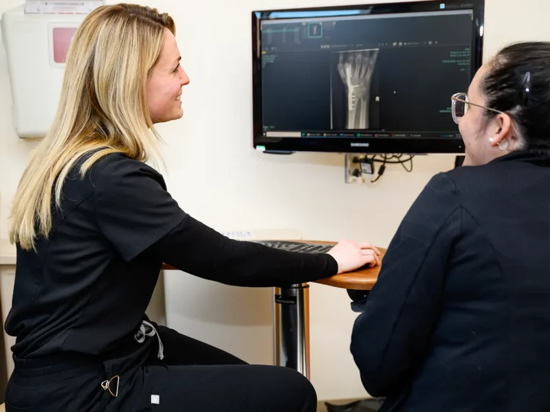 Provider showing someone xrays