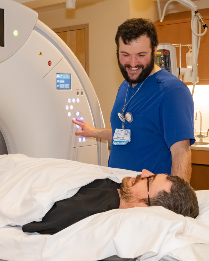 NMC Diagnostic Imaging staff member working MRI scanner
