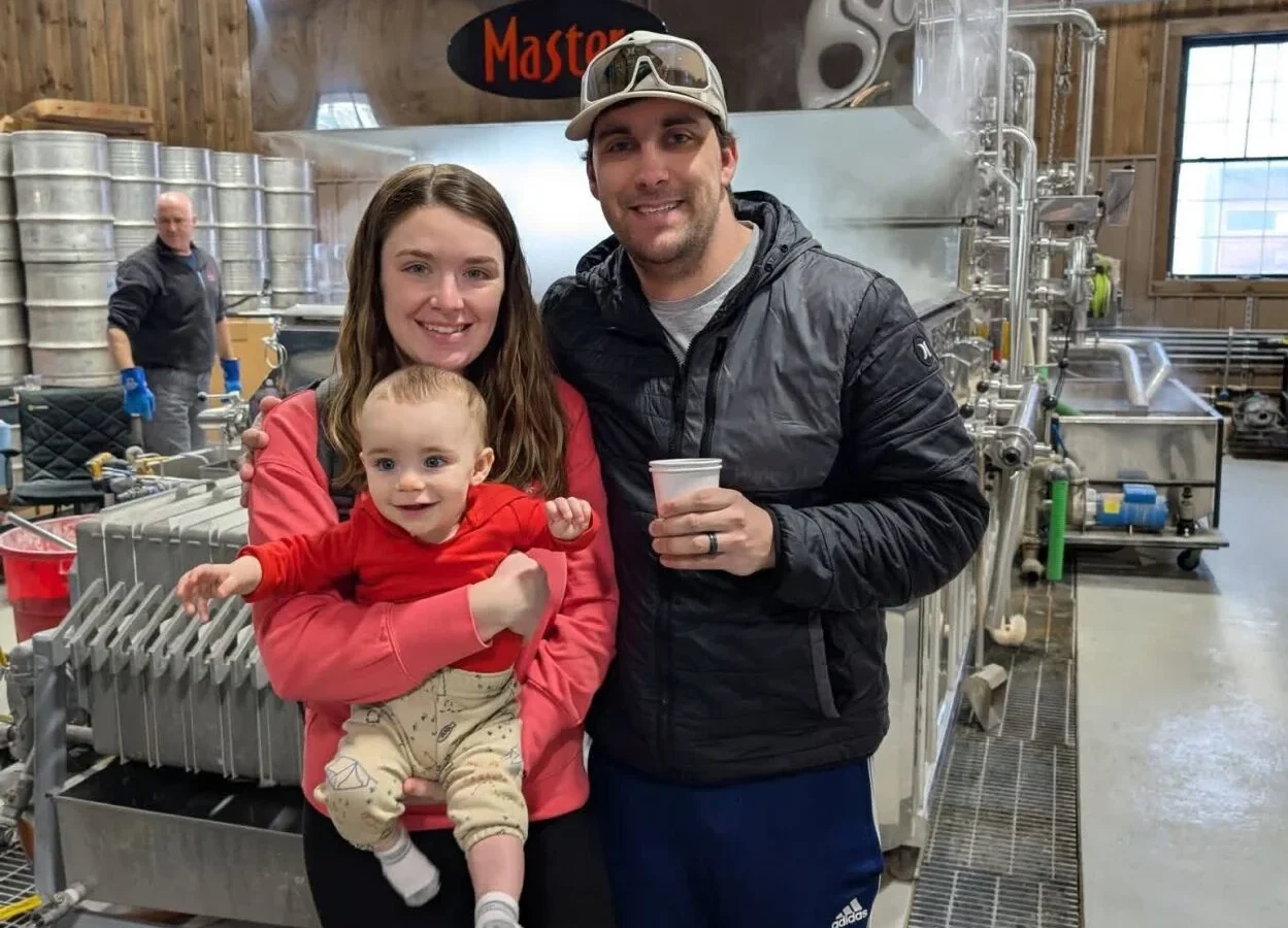 Caylin and Cameron Nielsen in Maple Sugaring house after birth of their son.