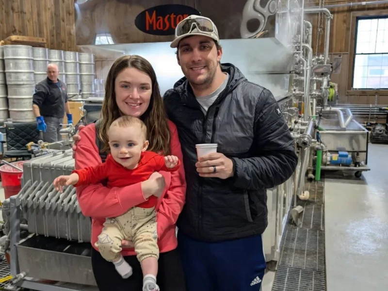Caylin and Cameron Nielsen in Maple Sugaring house after birth of their son.