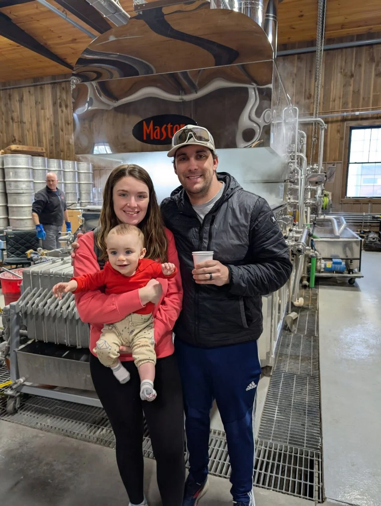 Caylin and Cameron Nielsen in Maple Sugaring house after birth of their son.