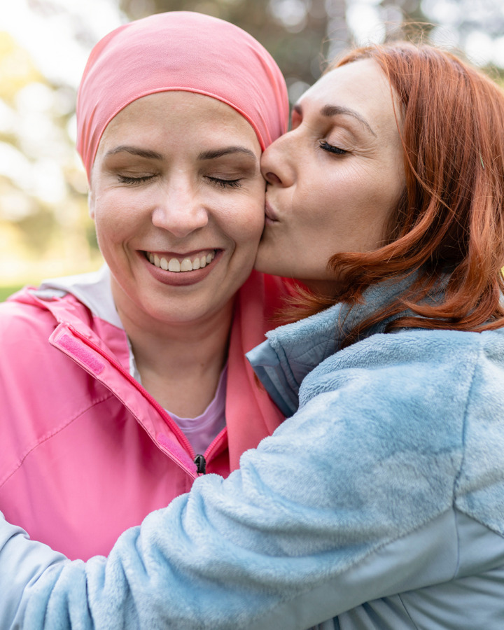 Woman being supportive of her friend with cancer